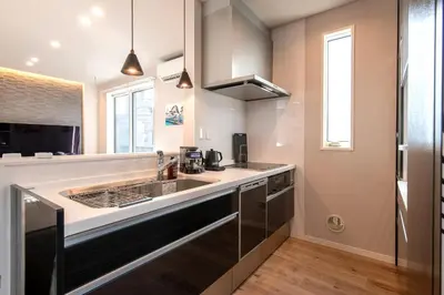 a kitchen with a sink and a counter at Ciel\u5357\u9ebb\u5e03 in Tokyo