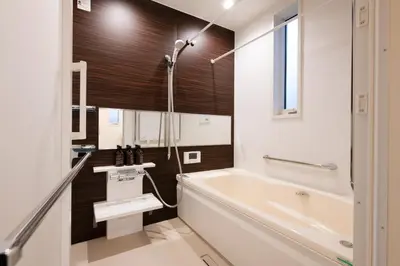 a bathroom with a white tub and a sink at Ciel\u5357\u9ebb\u5e03 in Tokyo