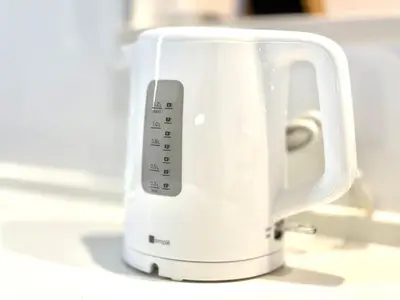 a white cup with a remote control in it at Katsushika House\u67f4\u53c8 KS0340 in Tokyo
