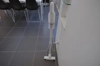 a hospital room with a white sterilizer on the floor at \u30d7\u30e9\u30a4\u30e0\u30c6\u30e9\u30b9\u4e0a\u6c60\u53f05\u4e01\u76ee in Tokyo