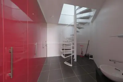 a bathroom with a glass shower and a sink at \u30d7\u30e9\u30a4\u30e0\u30c6\u30e9\u30b9\u4e0a\u6c60\u53f05\u4e01\u76ee in Tokyo