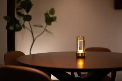 a candle sitting on top of a wooden table at \u30b5\u30f3\u30e2\u30fc\u30eb\u30af\u30ec\u30b9\u30c8306 in Tokyo
