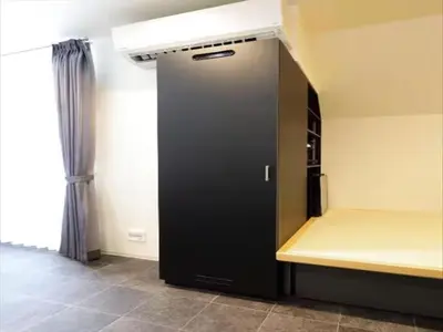 a black closet in a room with a bed at Chaan Ueno Hotel - Vacation STAY 01162v in Tokyo