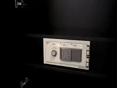 a microwave on a shelf in a dark room at Chaan Ueno Hotel - Vacation STAY 01157v in Tokyo