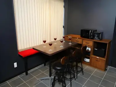 a table with three glasses of wine on it at Chaan Ueno Hotel - Vacation STAY 01157v in Tokyo