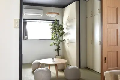 a room with a table and chairs and a window at Okada Building - Vacation STAY 18449 in Tokyo
