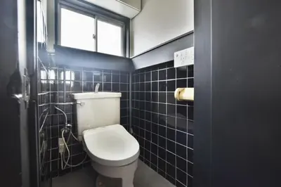 a bathroom with a white toilet and a window at Okada Building - Vacation STAY 18449 in Tokyo