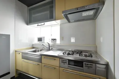 a kitchen with a sink and a stove at Okada Building - Vacation STAY 18449 in Tokyo