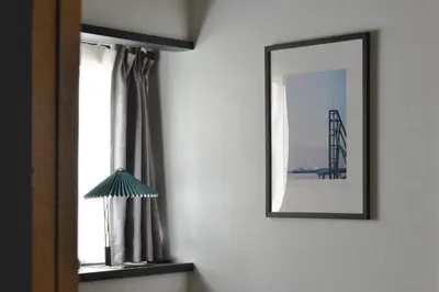 a mirror on a wall next to a window at Okada Building - Vacation STAY 18449 in Tokyo