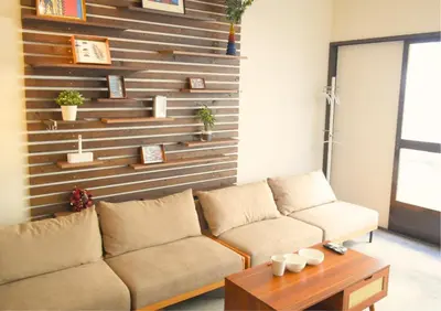 a living room with a couch and a table at Asakusa Sky House in Tokyo