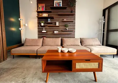 a living room with a couch and a coffee table at Asakusa Sky House in Tokyo