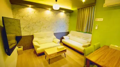 a living room with two couches and a table at Oyado Nene, Tokyo Heiwajima - Vacation STAY 23451v in Tokyo
