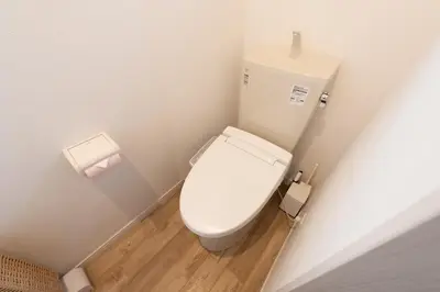 a small bathroom with a toilet in a room at \u697d\u9038\u30b0\u30eb\u30fc\u30d7 \u56db\u30c4\u6728 102t in Tokyo