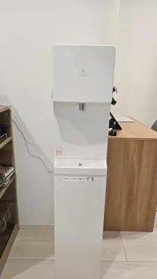 a white refrigerator with a white box on top of it at Cozy Nest Nakano 2 stops 5 min to Ikebukuro 7 stops to Shinjuku 15 min new 1LDK in Tokyo