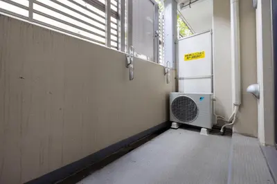 an empty room with a radiator and a window at \u30ec\u30b8\u30c7\u30a3\u30a2\u4e2d\u843d\u5408b in Tokyo