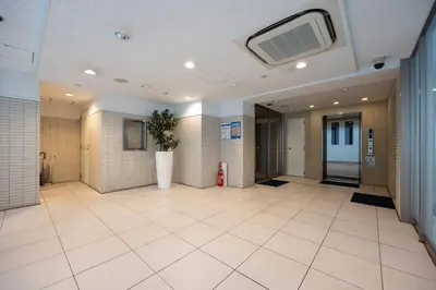 a hallway of a building with a large room at \u30ec\u30b8\u30c7\u30a3\u30a2\u4e2d\u843d\u5408b in Tokyo