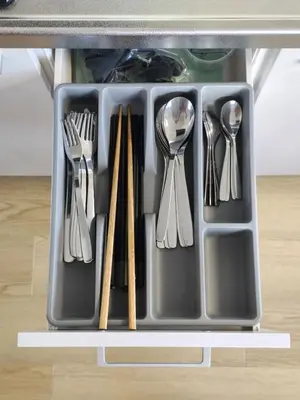 a tray with utensils in a drawer at YKO Guest house in Akihabara 60 square meters, 3 bedrooms, 1 living rooms elevator, sky tree view in Tokyo