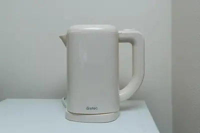 a white appliance sitting on top of a counter at Shinjuku sprem in Tokyo