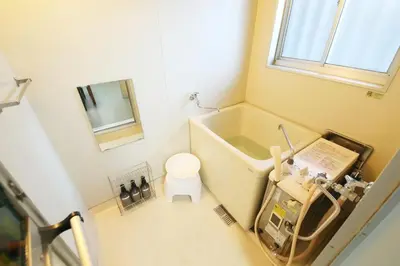 a small bathroom with a toilet and a sink at \u6b63\u6804\u30cf\u30a4\u30c4101 in Tokyo