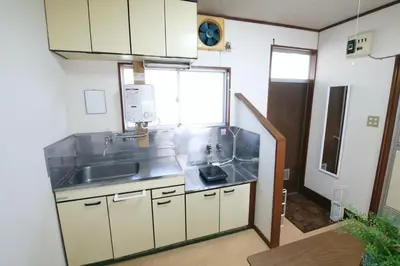 a small kitchen with a sink and a sinkessment at \u6b63\u6804\u30cf\u30a4\u30c4202 in Tokyo