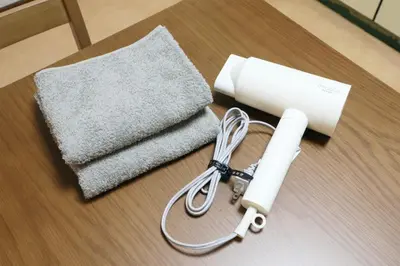 a roll of paper towels and a rolled up roll of paper towels at \u6b63\u6804\u30cf\u30a4\u30c4202 in Tokyo
