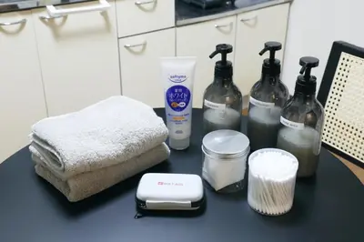 a counter with bottles of soap and other items on it at \u6b63\u6804\u30cf\u30a4\u30c4201 in Tokyo