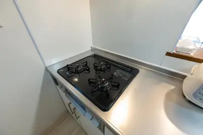 a stove top oven sitting on top of a counter at FINOA Residential Suite Higashikanamachi in Tokyo