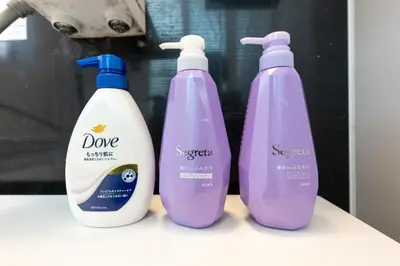 three bottles of detergents sitting on a counter at FINOA Residential Suite Higashikanamachi in Tokyo