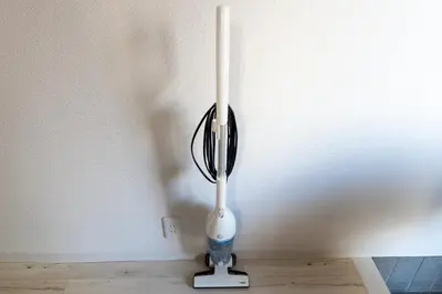 a whisk sitting on a stand in a room at FINOA Residential Suite Higashikanamachi in Tokyo