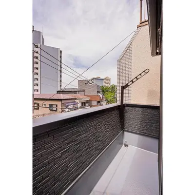 a balcony with a view of a city at Japan House Skytree \u30f4\u30a3\u30e9\u8cb8\u5207 A\u9928 in Tokyo