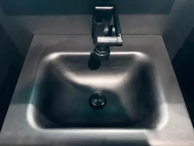 a silver sink with a faucet in a bathroom at Ikebukuro\u6b63\u548c\u5eb5 in Tokyo