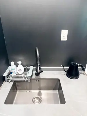 a kitchen sink with a faucet and a counter top at Ikebukuro\u6b63\u548c\u5eb5 in Tokyo