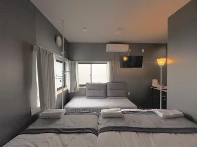 a small bedroom with a bed and a window at Ikebukuro\u6b63\u548c\u5eb5 in Tokyo