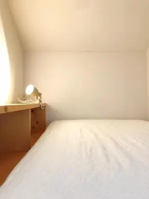 a bedroom with a white bed and a desk at KIKA STAY - Tokyo 202 with Car park in Tokyo