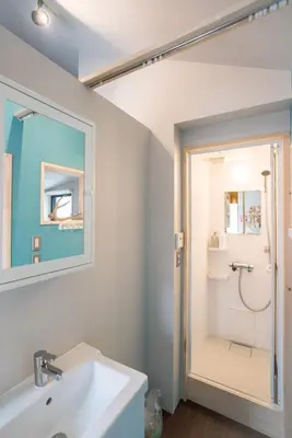 a bathroom with a sink and a shower at KIKA STAY - Tokyo 202 with Car park in Tokyo
