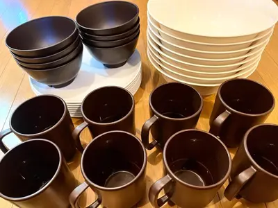 a group of cups and plates on a table at S,F, Heights - Vacation STAY 18516 in Tokyo
