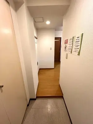 a hallway with white walls and a wooden floor at S,F, Heights - Vacation STAY 18516 in Tokyo