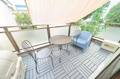 a balcony with a table and chairs on it at Contrail Room 203 - Vacation STAY 18527 in Tokyo