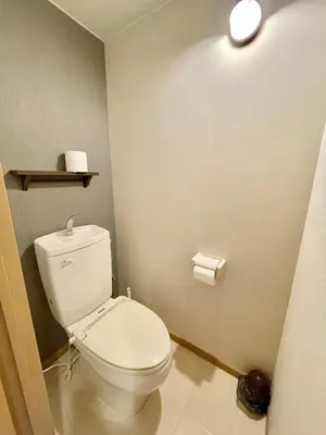 a bathroom with a white toilet in a room at YMK Oshiage 4B in Tokyo