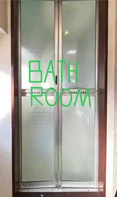a glass door with the words faithanooga written on it at Ueno Sky Garden in Tokyo