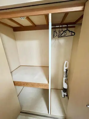 a room with a cell phone in a room at YMK Oshiage 7A in Tokyo