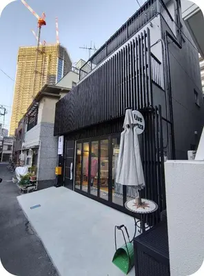 an umbrella sitting on a table outside of a building at Live in Ginza 70 square meters, 2 bedrooms, 1kitchen 4toilet 2bath,room, project in Tokyo