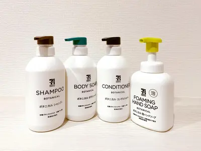 a group of four bottles of grooming mud soap at YayoiHotel in Tokyo