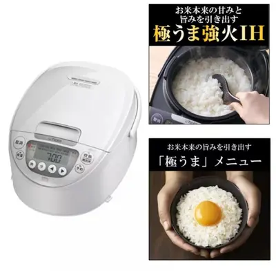 a picture of an egg in a bowl of rice at Japan House Ikebukuro Honcho in Tokyo