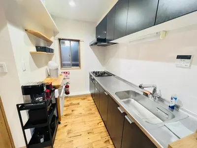 a kitchen with a sink and a counter top at New open ikebukuro Fangfun3 in Tokyo