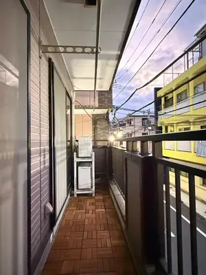 an empty hallway of a building with a balcony at New open ikebukuro Fangfun3 in Tokyo