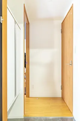 an open door to a room with white walls at 67 Apt Waseda Shinjuku in Tokyo