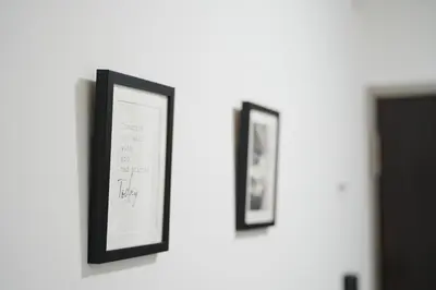 two framed pictures hanging on a wall at GLOU Koiwa Tokyo - Economic APT in a Japanese Local Shopping Street, with Direct Access to Shinjuku & Akihabara in Tokyo