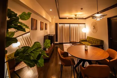 a living room with a table and chairs at Sun Mall Crest - Vacation STAY 18546 in Tokyo
