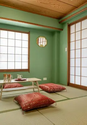 a room with two beds and a table and windows at Asakusa4\u5206\u949f\u6674\u7a7a\u585410\u5206\u949f\u65e5\u5f0f\u6e29\u99a8\u548c\u5bbf301 MAX9\u4eba \u9ad8\u901fWIF in Tokyo